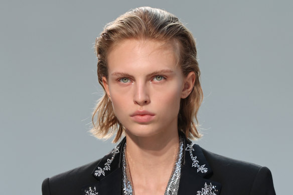 The Rabanne runway displayed a fresh face with a peachy eyeshadow and lip.