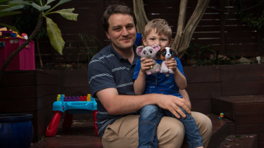 Mathematician Dr Stephen Woodcock with his five-year-old son Ben.