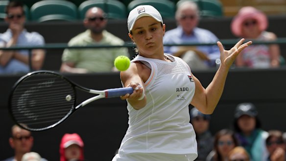 Ashleigh Barty returns to China's Saisai Zheng in their Women's singles match.
