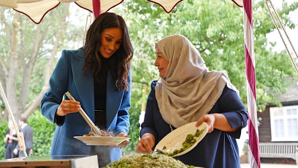 Meghan Markle helps launch the cook-book 'Together', a fundraiser for Grenfell fire victims, on September 20.