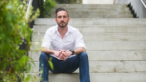 Assistant professor at University of Canberra Eamon Merrick says he and colleagues are burning out, forced to work long nights and weekends to meet unsustainable workloads.