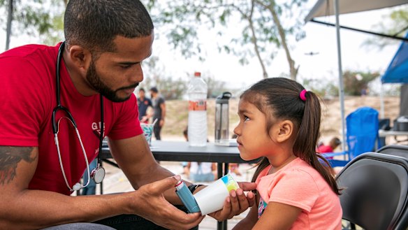 Dr Elisondo treats Estephanie, 4, for asthma.