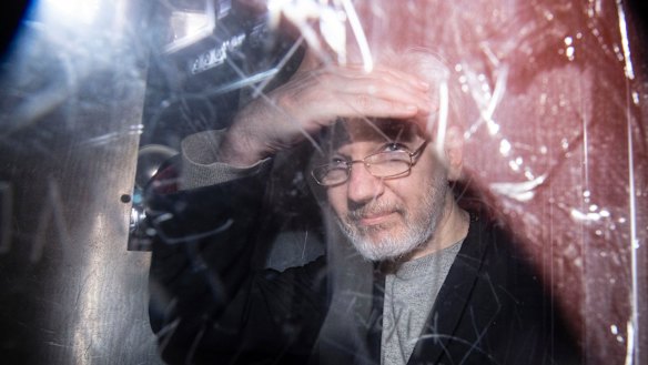 Wikileaks founder Julian Assange leaves in a prison van after appearing at Westminster Magistrates Court, London, in January.