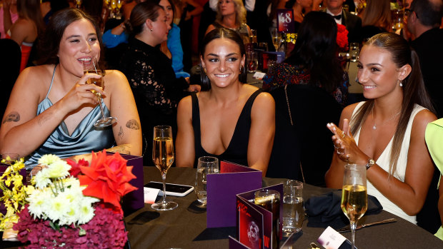 Monique Conti (centre) has won the AFLW best and fairest award.