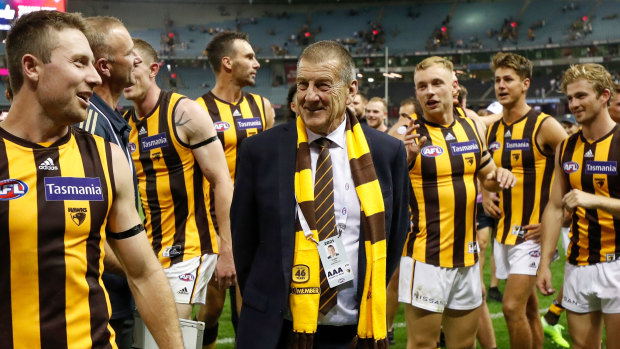 Jeff Kennett with Hawthorn players after their one point win over Essendon earlier in the season.