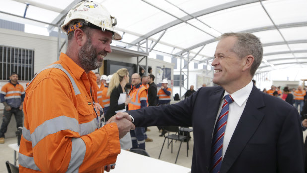 Opposition Leader Bill Shorten meets with West Gate tunnel construction workers in Melbourne on Monday.