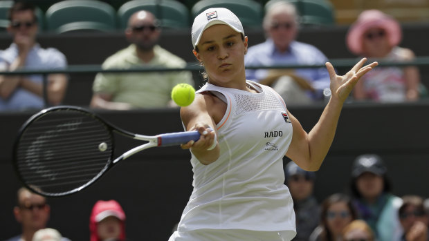 Ashleigh Barty returns to China's Saisai Zheng in their Women's singles match.