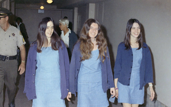 Charles Manson followers, from left: Susan Atkins, Patricia Krenwinkel and Leslie Van Houten, walk to court to appear for their roles in the 1969 cult killings of seven people, including pregnant actress Sharon Tate, in Los Angeles.