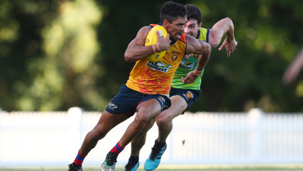 A spring in his step: Charlie Cameron puts on a burst of speed during a pre-season training session.