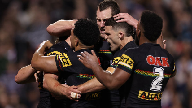 Luke Garner celebrates a try with Nathan Cleary, Sunia Turuva and Isaah Yeo.