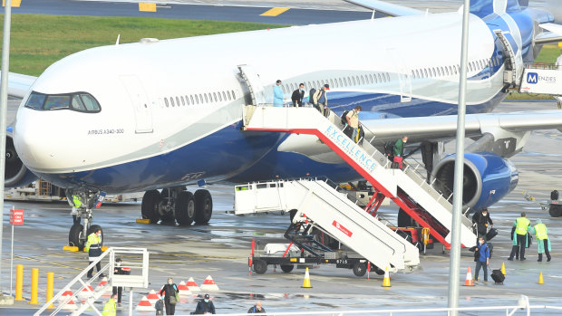 Passengers from aboard the Antarctica Cruise ship The Greg Mortimer arrive at Melbourne Airport from Uruguay.