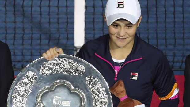 Silver service: Ash Barty poses with her runners-up trophy.