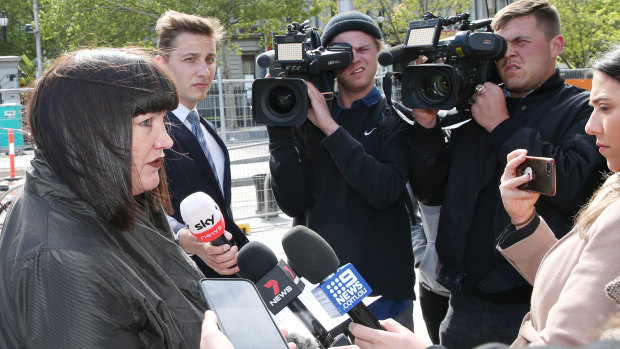 Raelene Castle is grilled by the media following the Folau settlement.