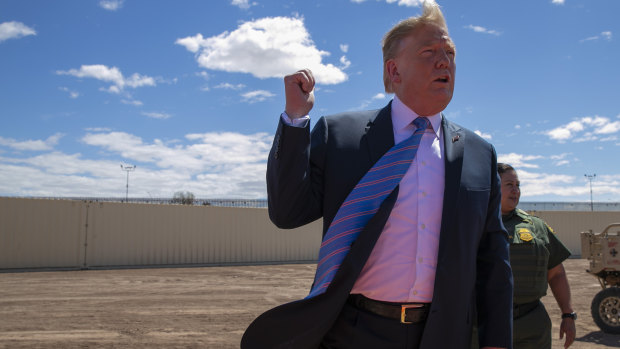 Trump speaks at a new section of the border wall with Mexico on April 5.