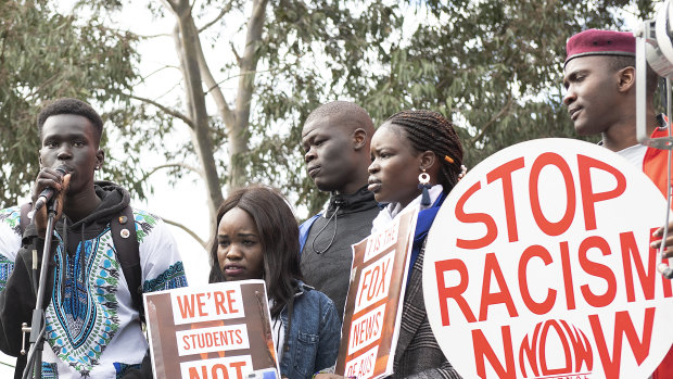 Up to 500 people took part in a protest outside Channel 7's Melbourne headquarters against what they say is 'racist' reporting of crime in the African Australian community.