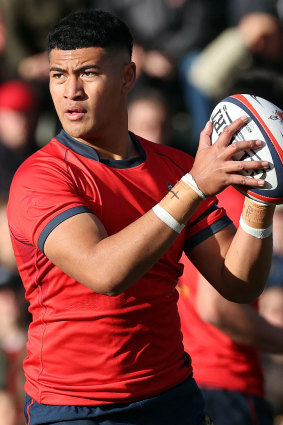 Isaiya Katoa playing rugby for Barker College in his last year of school.