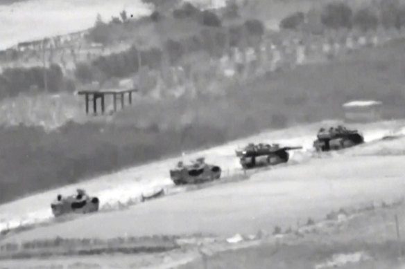 In this undated image taken from video released by the Israel Defence Forces, a line of Israeli tanks are shown during an incursion into the Gaza Strip.