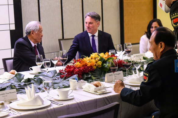 Defence Minister Richard Marles in Singapore with his counterparts from Singapore, Ng Eng Hen (left), and Wei Fenghe from China.