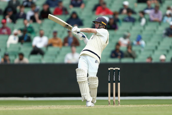 Harris plays an expansive shot against a star-studded NSW bowling attack at the MCG on Sunday.