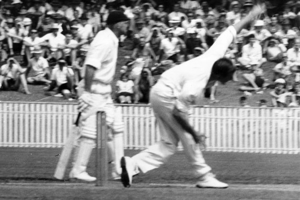 Ian Meckiff delivers during the over in which he was no-balled four times by umpire Colin Egar.