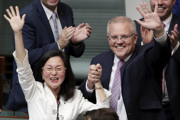 Liberal MP Gladys Liu and Prime Minister Scott Morrison after her maiden speech, in which she declared, “How good is Australia?”