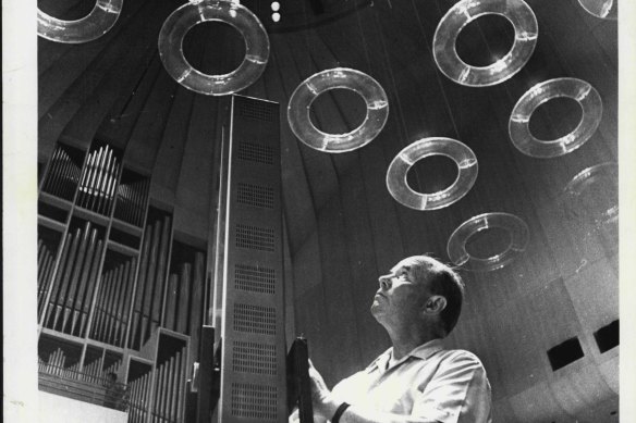 Danish acoustic technician Vilhelm Jordon “tunes” the acoustic reflectors in the concert hall in 1972.