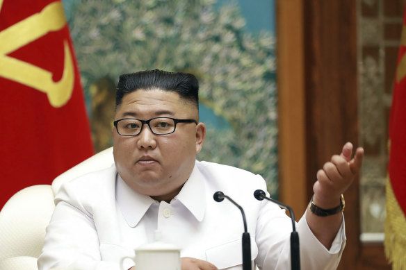Kim Jong-un attends an emergency Politburo meeting in Pyongyang on July 25.