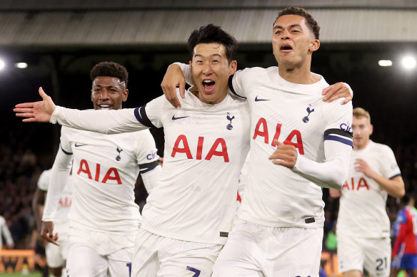 Son Heung-Min and Tottenham teammates celebrate a goal.