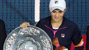 Silver service: Ash Barty poses with her runners-up trophy.