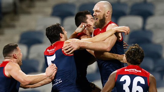 The Demons erupt after Max Gawn’s match-winning goal against Geelong.