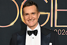 John Aiken is leaving Aussie shores or a short stint on NZ TV.