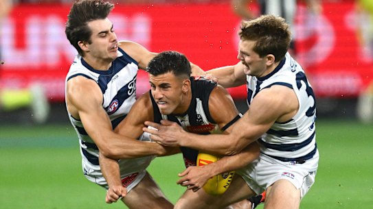 Caught: Nick Daicos and his Magpies have hit a road bump, with the Cats among the teams now challenging for a top-two berth.