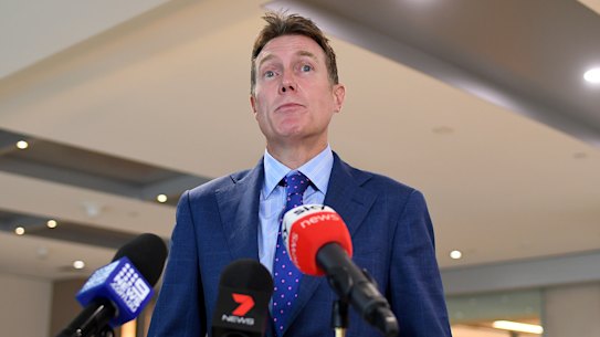 Attorney General and Minister for Industrial Relations Christian Porter speaks to the media following a roundtable with union and employer representatives to discuss workplace issues linked to the coronavirus in Sydney, Tuesday, March 10, 2020. (AAP Image/Joel Carrett) NO ARCHIVING