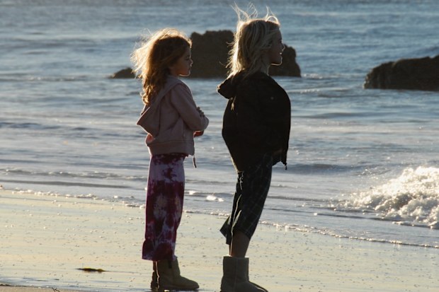 Kaia and Presley Gerber as children in a previously unseen family photo.