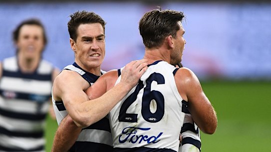 Jeremy Cameron and Tom Hawkins of the Cats celebrate a goal.