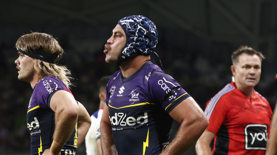 Jahrome Hughes and referee Chris Butler.