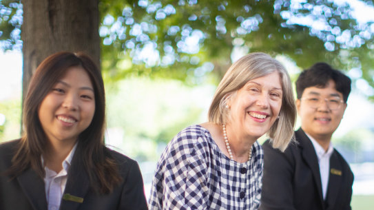 Camberwell High School principal Jillian Laughlin and international students Ryan Shan and Meilee Rianrukwong. 