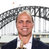 Rugby Australia CEO Phil Waugh poses with the Webb Ellis Cup in Sydney after the announcement of the host cities