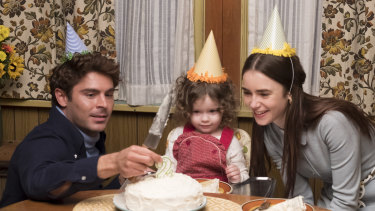 This image released by Netflix shows Zac Efron, left, and Lily Collins, right, in a scene from Extremely Wicked, Shockingly Evil, and Vile. 
