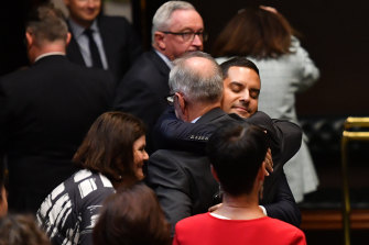 Alex Greenwich is congratulated by his parliamentary supporters following the successful passage of the bill.