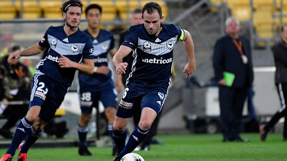 Hot-footing it: Leigh Broxham leads the charge for Victory during their round 23 loss to the Phoenix at  Westpac Stadium in Wellington.