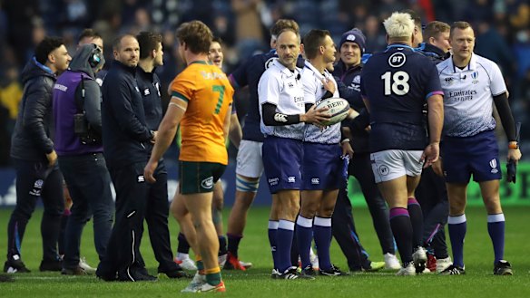 Hooper walks off the field after the match.