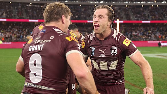 Cameron Munster and Harry Grant celebrate victory in Origin II in Perth.
