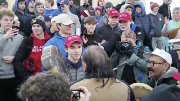 The Catholic Diocese of Covington in Kentucky is looking into this and other videos that show youths, possibly from the diocese's all-male Covington Catholic High School, mocking native Americans at a rally in Washington. 