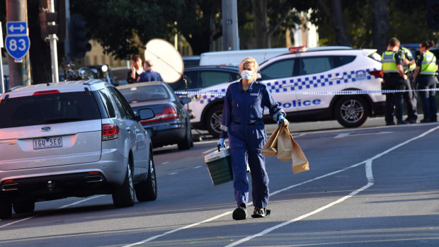 Police at the scene of the fatal shooting outside the Melbourne Pavilion in Kensington in March.