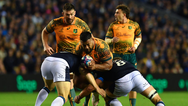 Taniela Tupou takes a carry against Scotland. 