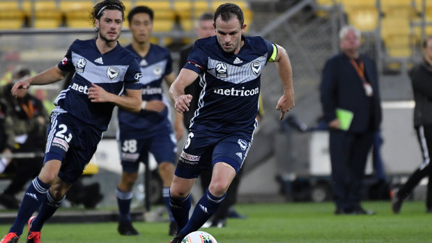 Hot-footing it: Leigh Broxham leads the charge for Victory during their round 23 loss to the Phoenix at  Westpac Stadium in Wellington.