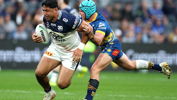 North Jason Queensland is Taumalolo Taumalolo takes a hit-up against you to talk to.