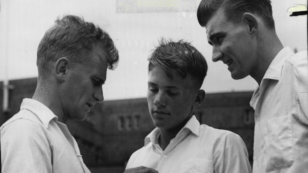 Peter Philpott, left, gives bowling advice to Stuart Webster and Darrell Morris in 1962.