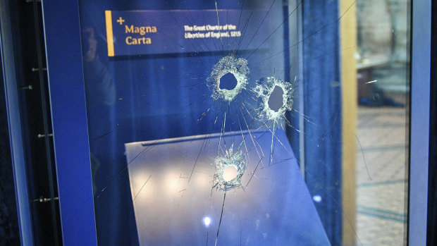 Hammer holes in the glass case that housed the Magna Carta, at Salisbury Cathedral.